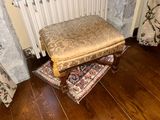 a wooden floor in a room with a chair and a rug