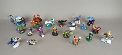many figurines of different types and sizes on the table