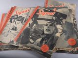 plusieurs magazines consacrés à divers films sont empilés les uns sur les autres