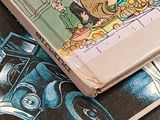two books that are sitting on top of each other