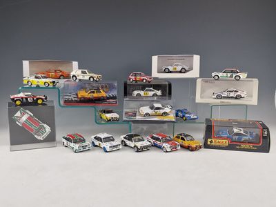 a lot of toy cars on display in a display case