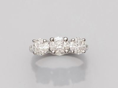 Bague en or gris 750°/°°(18K), sertie de diamants princesses… - Photo 1