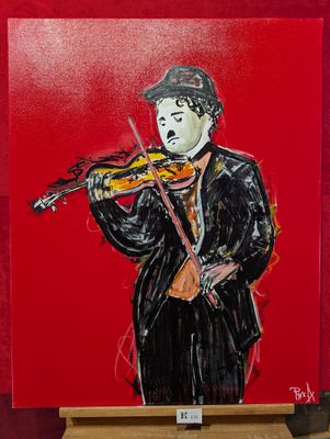 tableau représentant un homme jouant du violon sur un fond rouge