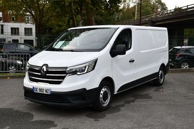 a white van that is parked in a parking lot