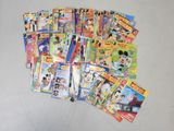 a lot of disney comics on the table