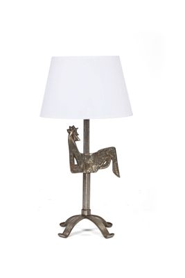 an image of a lamp with a horse on it