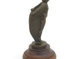 an image of a bronze statue of a woman with a veil on her head