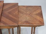 three wooden tables with a chevroned top on a white background