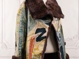 an image of a jacket on a mannequin stand