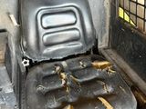 a seat that has been left in the back of a truck