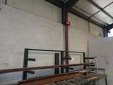a picture of a room with a lot of wooden benches