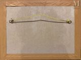 a picture of a piece of paper with a string attached to it