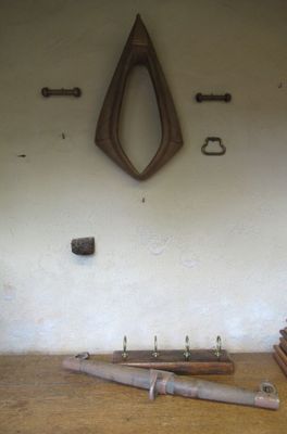 a wall that has a bunch of tools on it