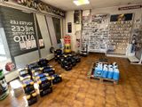 many bottles of alcohol on the floor in a store