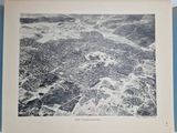 an old black and white photo of an aerial view of a city