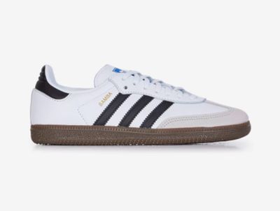 a white and black adidas sneakers on a white background