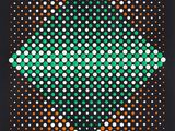 an orange and green dot pattern on a black background