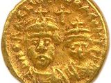 une pièce d'or portant l'image d'un homme et d'une femme