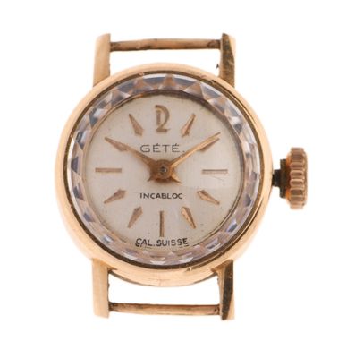a close up of a wrist watch on a white background
