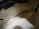 a close up of a handbag with a zipper on it