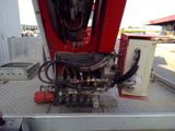 an image of a truck with a large engine on the back of it