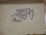 an old picture of a group of people on the street
