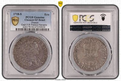 two pieces of silver coins in a clear plastic case
