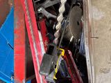 a box full of tools sitting on the floor