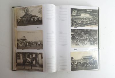 an open book with pictures of people on it