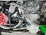 a suitcase full of assorted items that are in it
