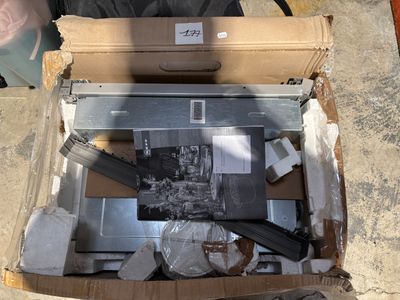 a cardboard box with a computer inside of it