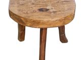 a small wooden stool that has a heart shaped design on it