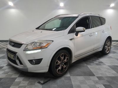 the white ford kuga is parked on a checkered tile floor