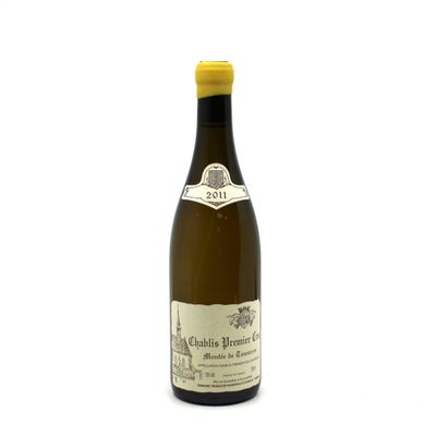 a bottle of wine that is sitting on a table