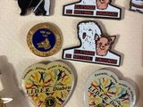 a lot of pins that are on a table