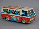 a toy bus with people on the side of it
