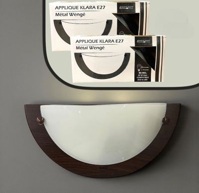 a mirror that has a picture of a cell phone on it