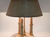 a lamp that is sitting on a table with a lamp on it