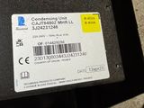 a label on the back of a car that says condensing unit