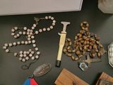 a table with a bunch of religious items on it