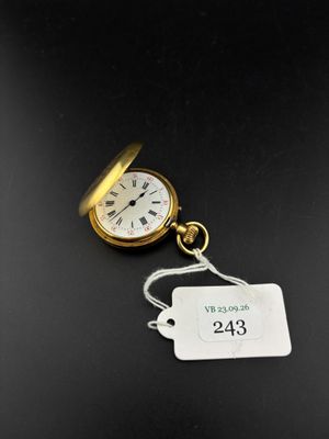 a close up of a pocket watch with a price tag attached to it