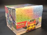 a box of pokemon cards sitting on a table