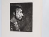 une vieille photo en noir et blanc d'un homme barbu