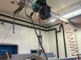a machine that is working on a piece of metal
