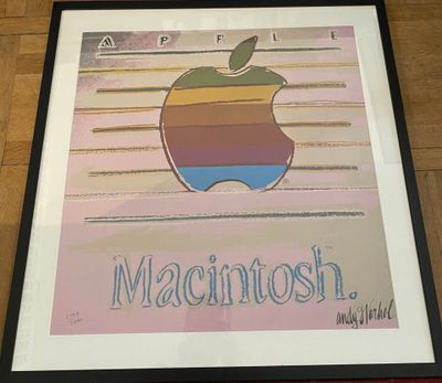 a picture of a picture of an apple logo on the wall