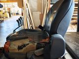 an image of a car seat that is sitting on a table