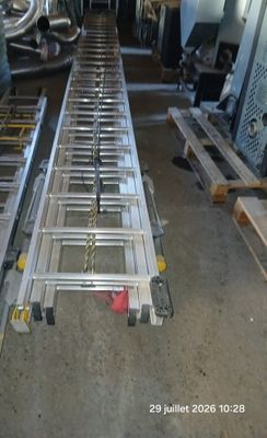 a picture of a long metal ladder in a warehouse