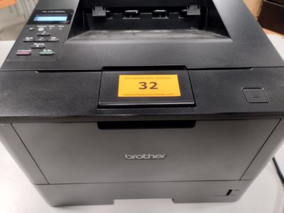 a printer that is sitting on top of a table