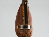 an old fashioned musical instrument hanging from the ceiling