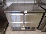 a stainless steel counter in a commercial kitchen
